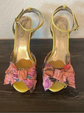 The Ultimate Statement Shoe! 🌸 
Poetic License Yellow and Pink Heels with a Bow
